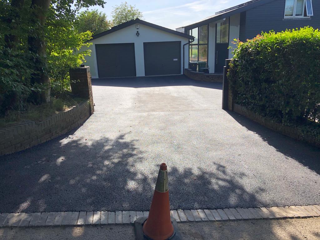 This is a photo of a bitumen driveway which is in the process of being installed by Camberwell Road Tech